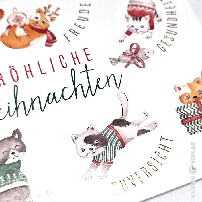 Eine festliche Grußkarte mit Aquarellillustrationen süßer Katzen und eines Fuchses, umgeben von deutschem Feiertagstext.