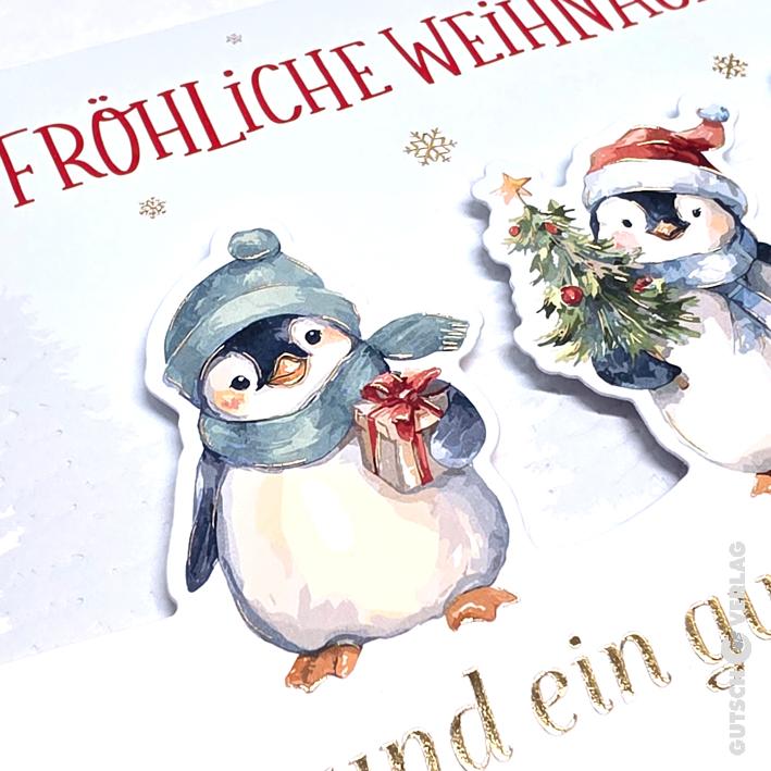 Zwei niedliche illustrierte Pinguine mit Wintermützen und Schals, einer hält ein Geschenk und der andere einen kleinen geschmückten Baum.