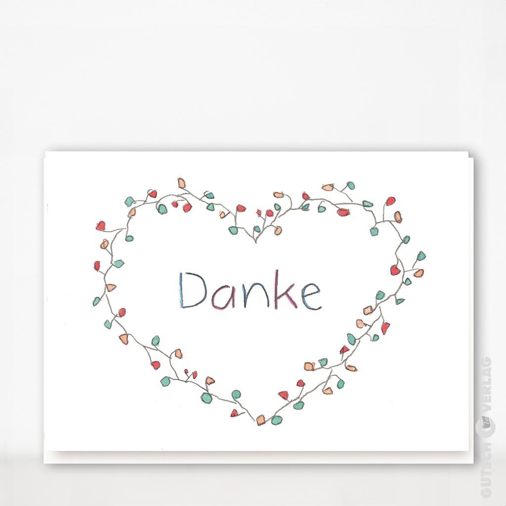 Handgezeichnete Karte mit dem Wort „Danke“, umgeben von einer herzförmigen Ranke aus bunten Blättern.