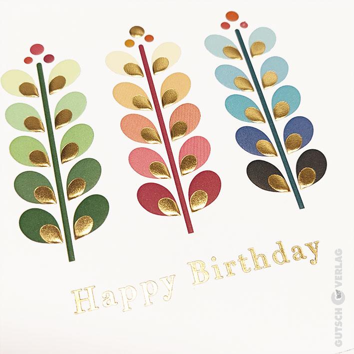 Eine Geburtstagskarte mit drei stilisierten Blumenstielen mit bunten, vergoldeten Blättern und dem Text „Happy Birthday“.